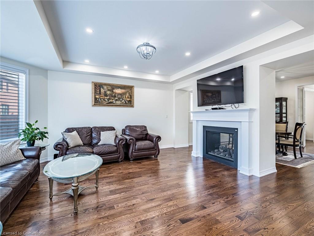 323 Harold Dent Trail, Oakville, ON - Indoor Photo Showing Living Room With Fireplace