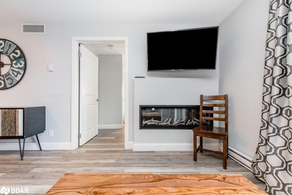307-80 Horseshoe Boulevard, Oro-Medonte, ON - Indoor With Fireplace