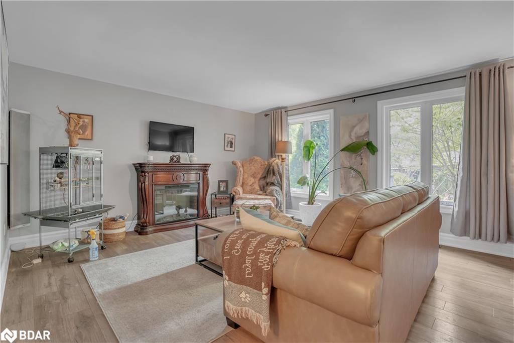 59 Withall Grove, Tiny, ON - Indoor Photo Showing Living Room With Fireplace