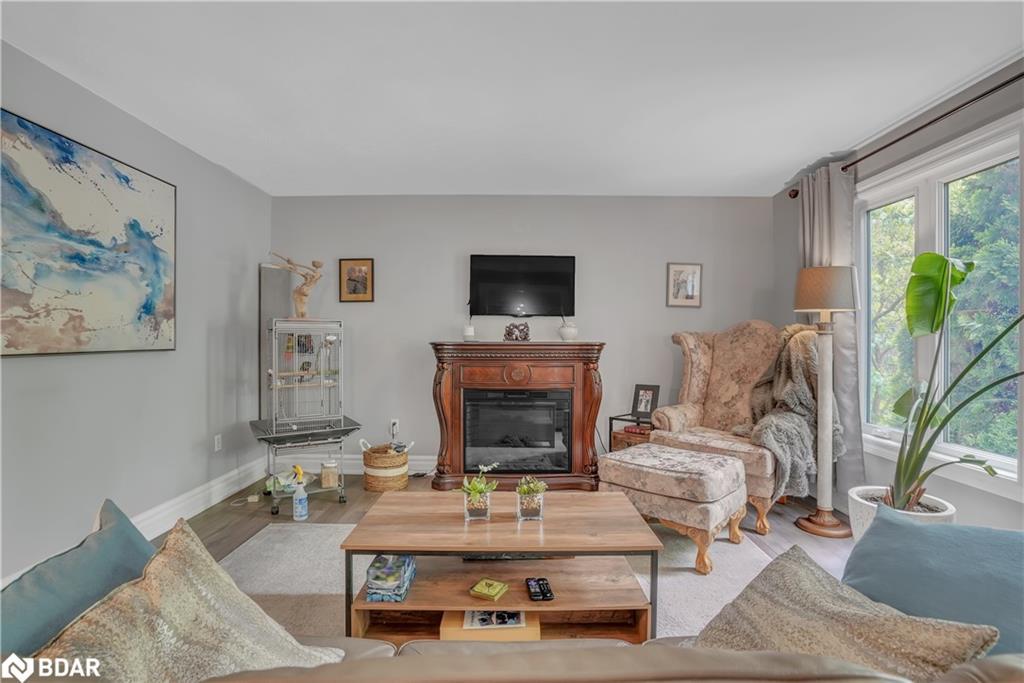 59 Withall Grove, Tiny, ON - Indoor Photo Showing Living Room With Fireplace