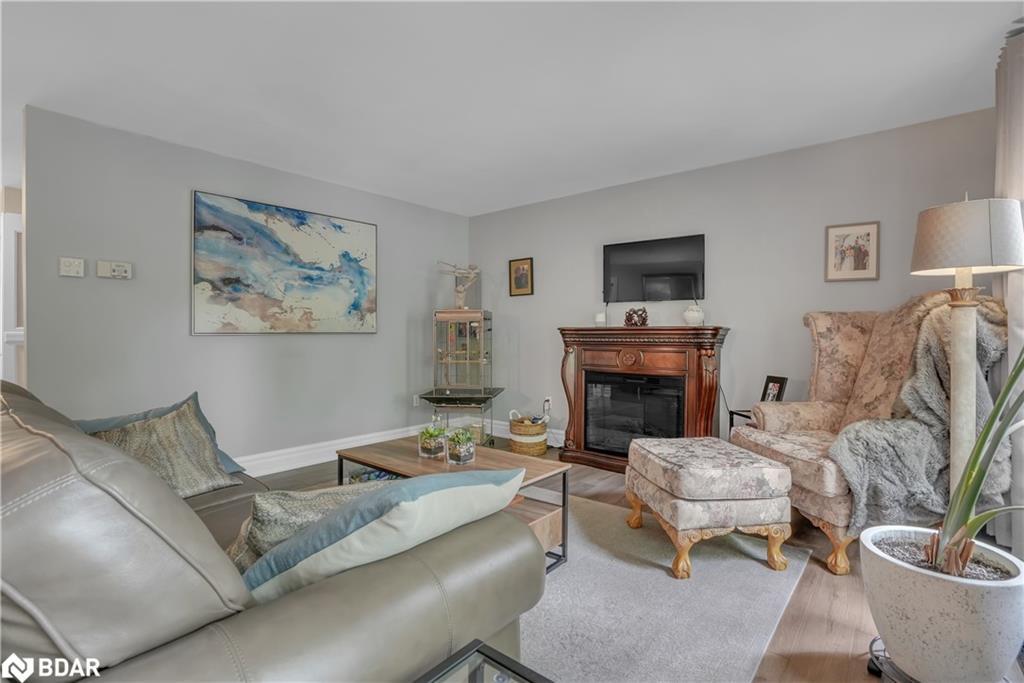 59 Withall Grove, Tiny, ON - Indoor Photo Showing Living Room With Fireplace