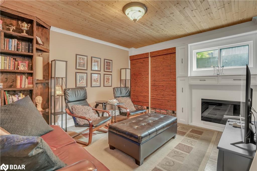 59 Withall Grove, Tiny, ON - Indoor Photo Showing Living Room With Fireplace