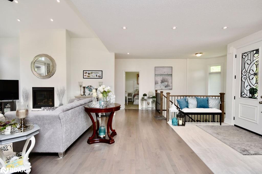 2 Sycamore Circle, Springwater, ON - Indoor Photo Showing Living Room With Fireplace