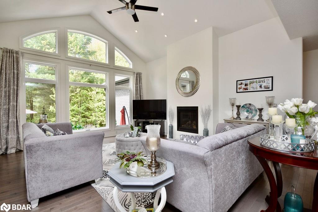 2 Sycamore Circle, Springwater, ON - Indoor Photo Showing Living Room With Fireplace