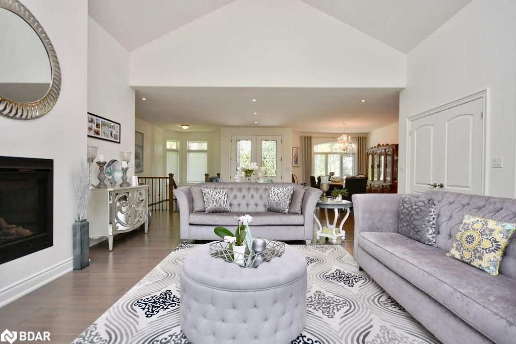 2 Sycamore Circle, Springwater, ON - Indoor Photo Showing Living Room With Fireplace