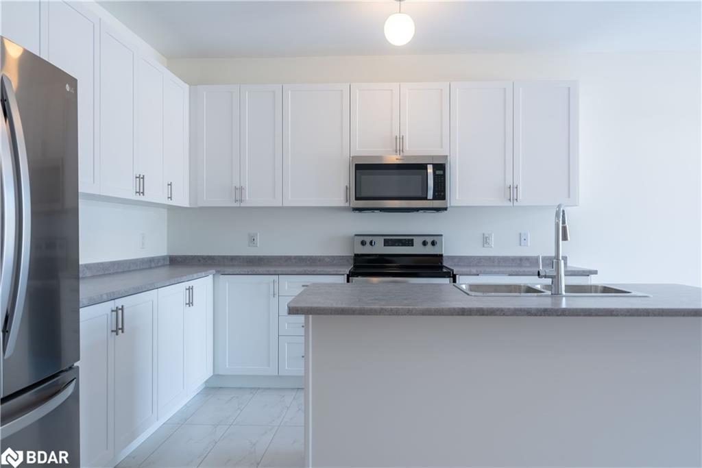 220 Ramblewood Drive, Wasaga Beach, ON - Indoor Photo Showing Kitchen With Double Sink