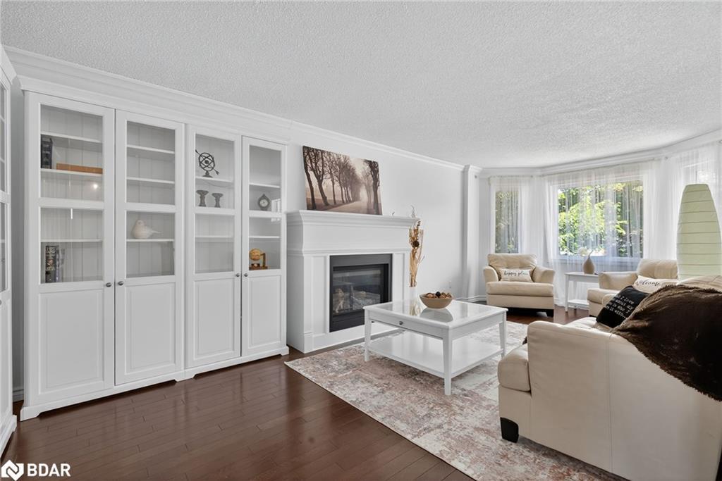 2 Birchmount Circle, Wasaga Beach, ON - Indoor Photo Showing Living Room With Fireplace