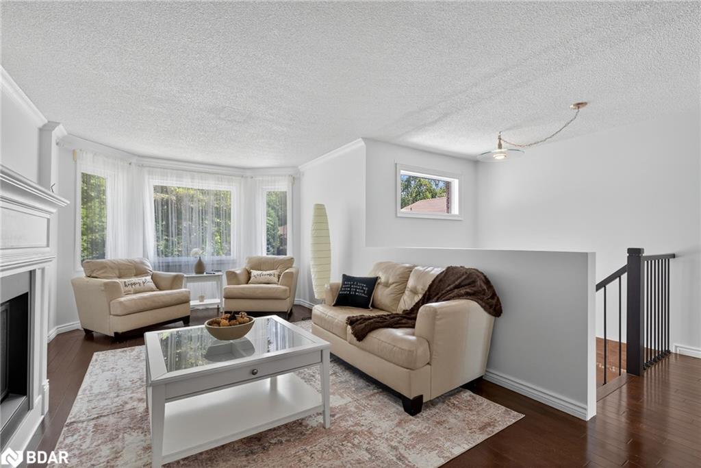 2 Birchmount Circle, Wasaga Beach, ON - Indoor Photo Showing Living Room With Fireplace