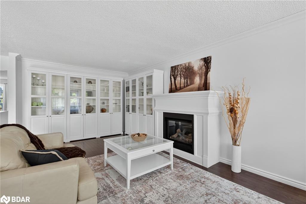 2 Birchmount Circle, Wasaga Beach, ON - Indoor Photo Showing Living Room With Fireplace
