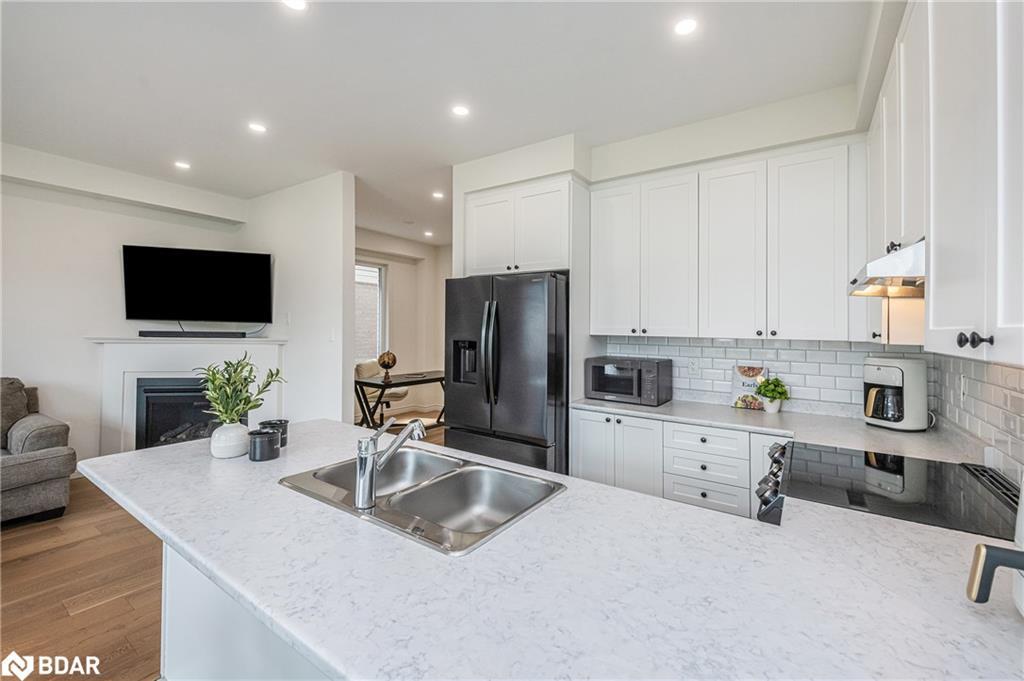 35 Povey Road, Fergus, ON - Indoor Photo Showing Kitchen With Fireplace With Double Sink
