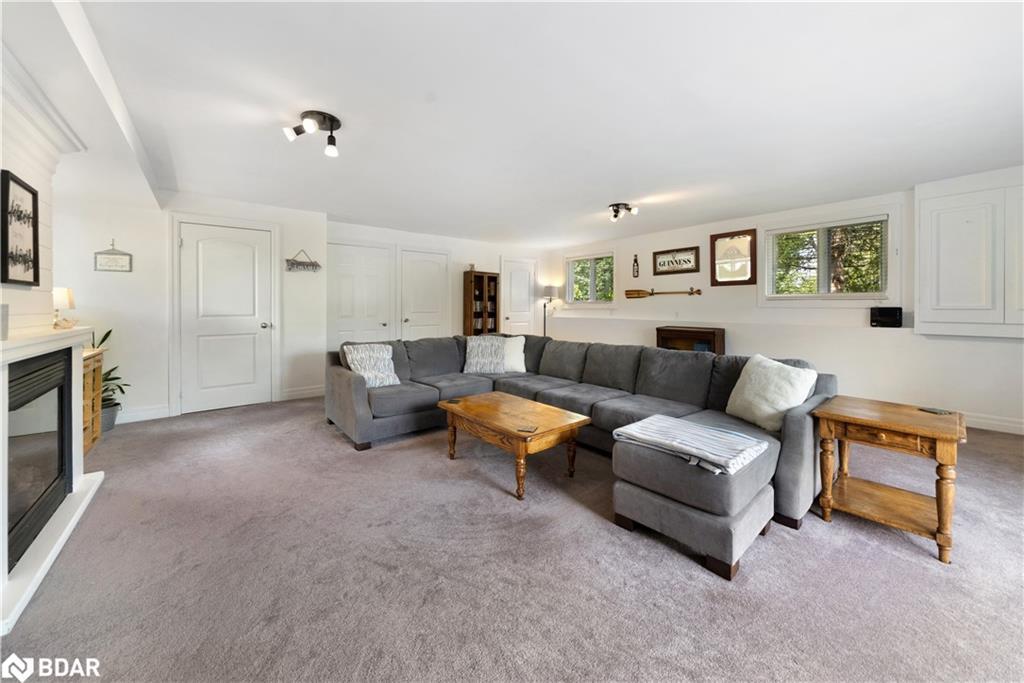 3 Earldom Boulevard, Port Mcnicoll, ON - Indoor Photo Showing Living Room With Fireplace