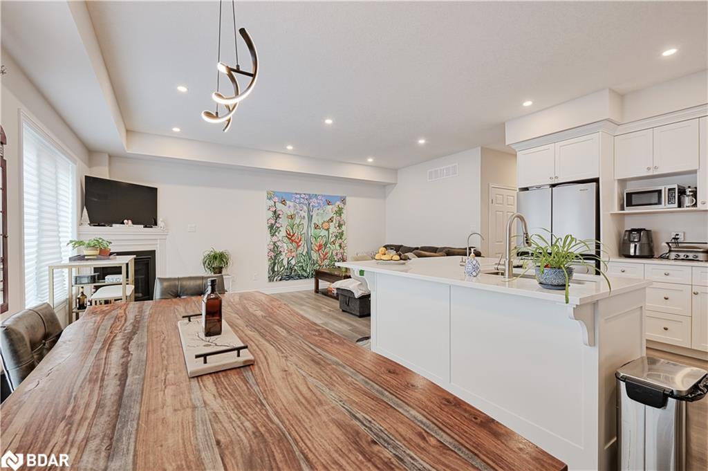 80 Mill Race Crescent, St. Jacobs, ON - Indoor Photo Showing Kitchen With Fireplace