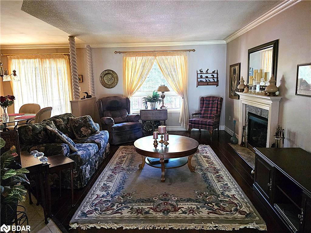 28 Cranberry Heights, Wasaga Beach, ON - Indoor Photo Showing Living Room With Fireplace
