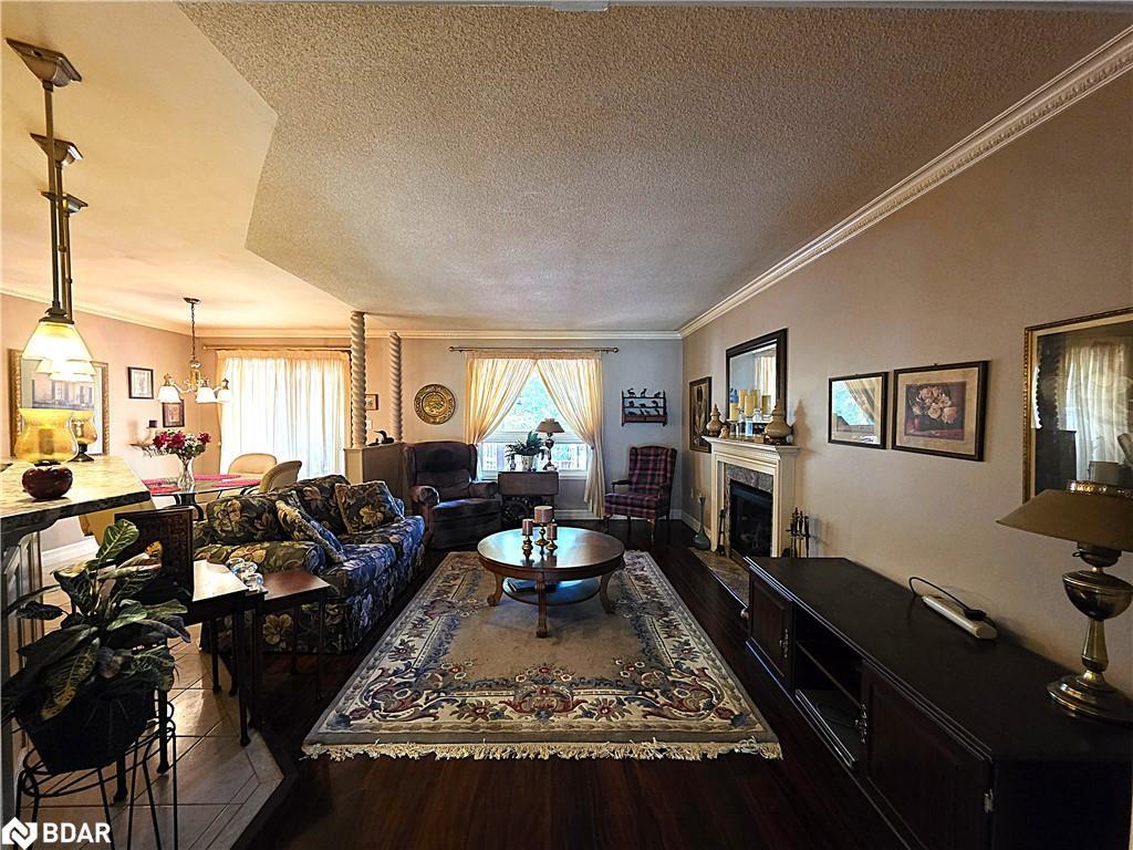 28 Cranberry Heights, Wasaga Beach, ON - Indoor Photo Showing Other Room With Fireplace