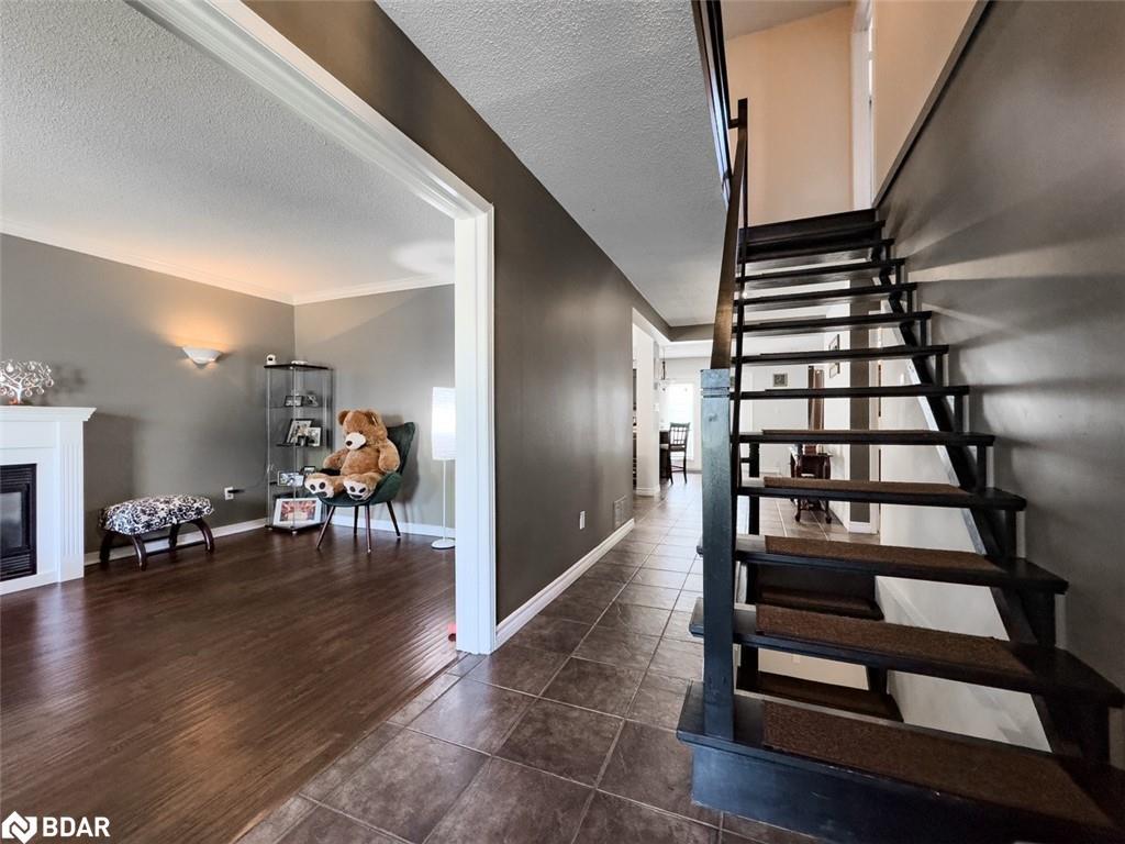 18 Cotswold Court, Georgetown, ON - Indoor Photo Showing Other Room With Fireplace