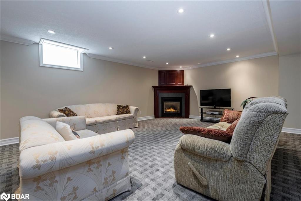34 Heatherwood Drive, Springwater, ON - Indoor Photo Showing Other Room With Fireplace