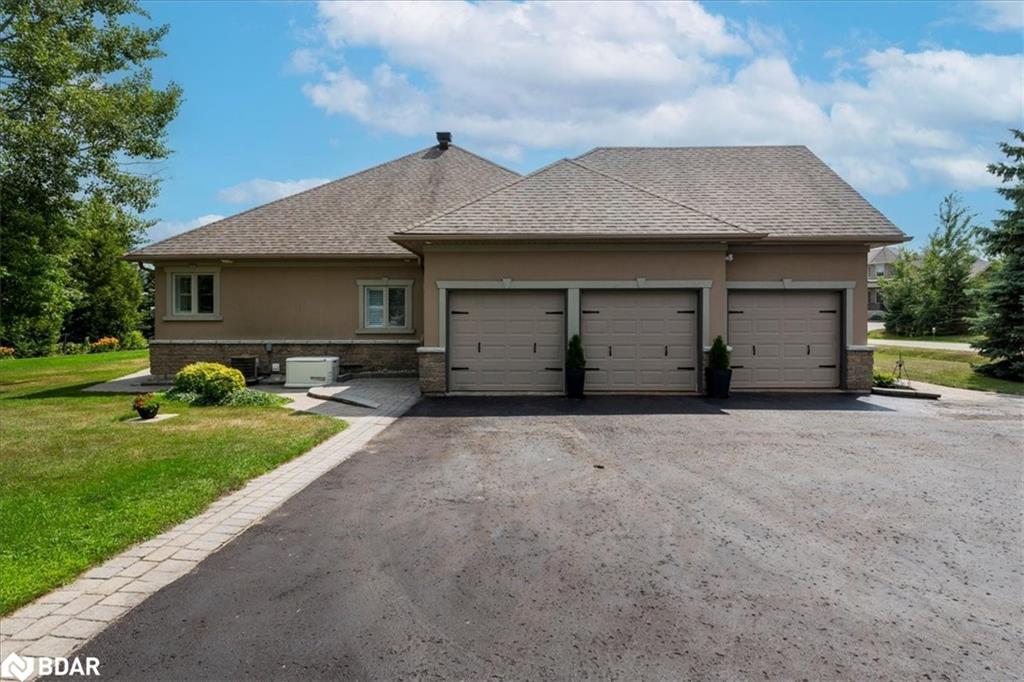 34 Heatherwood Drive, Springwater, ON - Outdoor With Facade