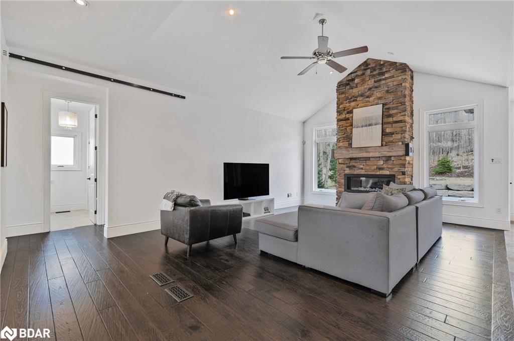 25 Heron Boulevard, Springwater, ON - Indoor Photo Showing Living Room With Fireplace