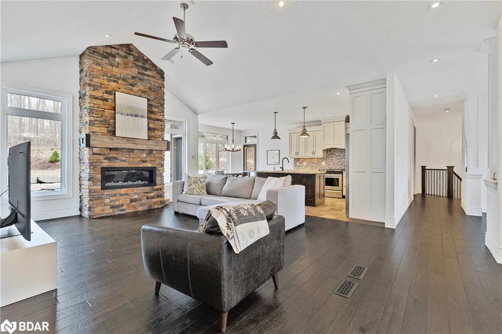 25 Heron Boulevard, Springwater, ON - Indoor Photo Showing Living Room With Fireplace