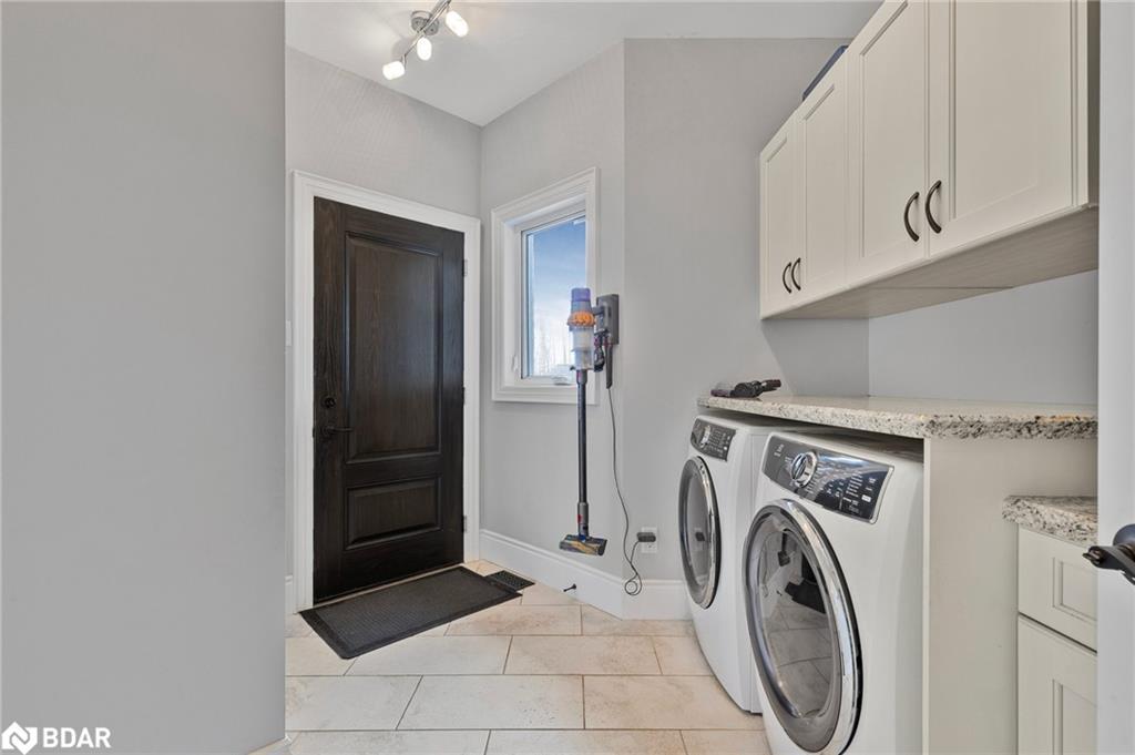 25 Heron Boulevard, Springwater, ON - Indoor Photo Showing Laundry Room