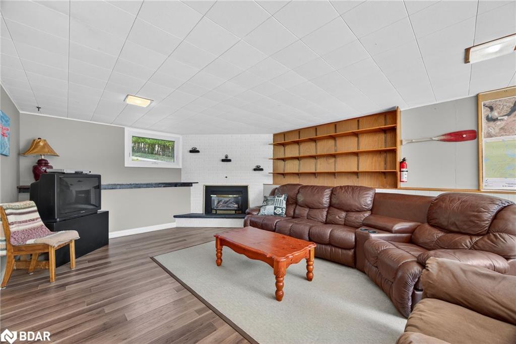 389 Falcon Road, Huntsville, ON - Indoor Photo Showing Living Room With Fireplace