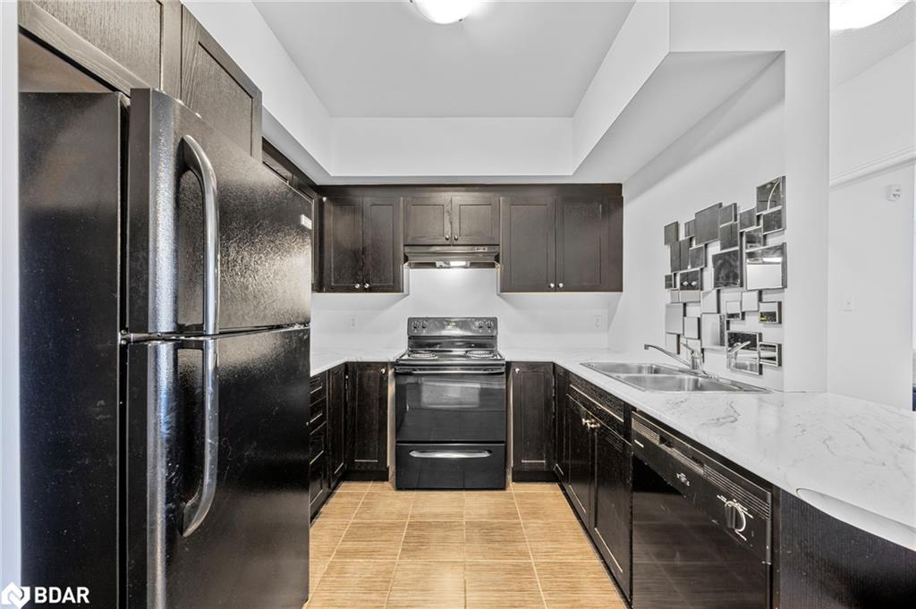 205-720 Yonge Street, Barrie, ON - Indoor Photo Showing Kitchen With Double Sink