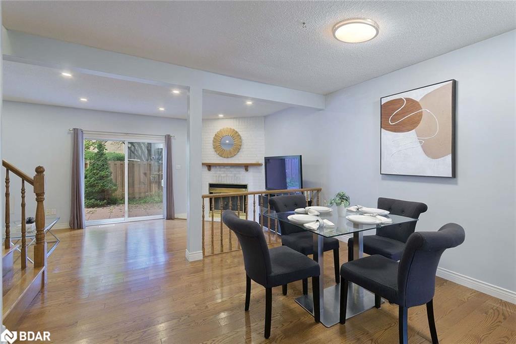 34-800 Upper Paradise Road, Hamilton, ON - Indoor Photo Showing Dining Room With Fireplace