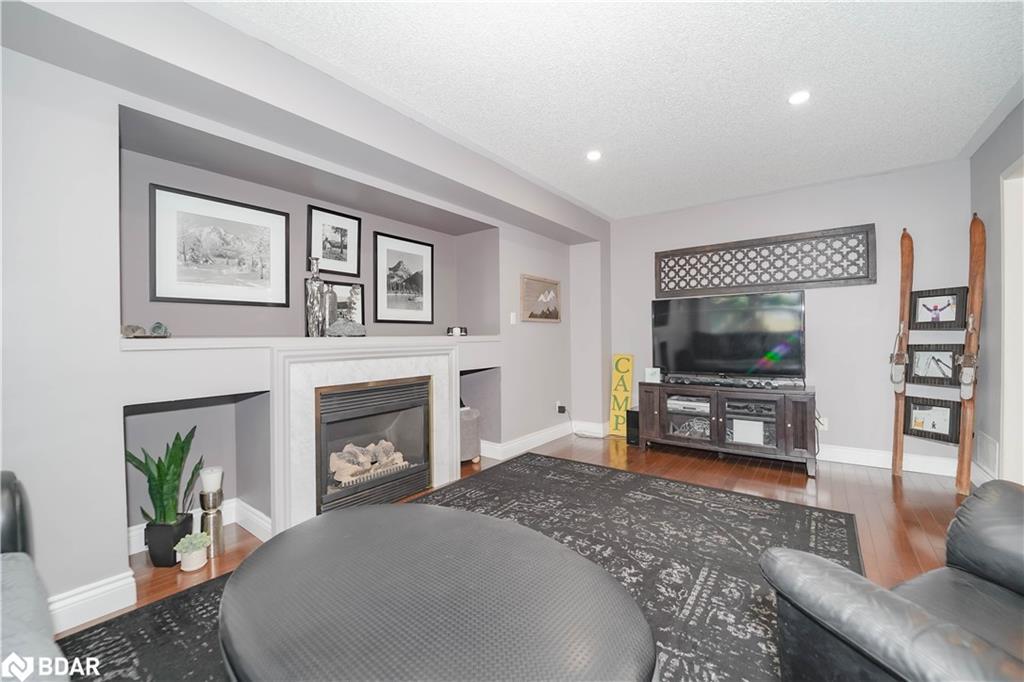 50 Gartshore Drive, Whitby, ON - Indoor Photo Showing Living Room With Fireplace