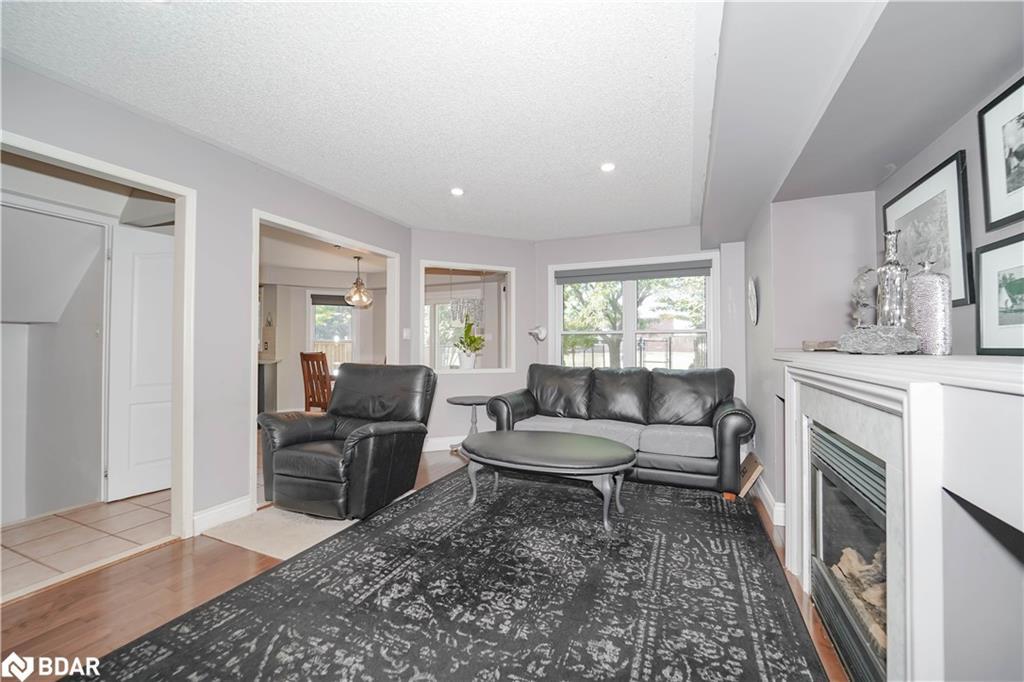 50 Gartshore Drive, Whitby, ON - Indoor Photo Showing Living Room With Fireplace