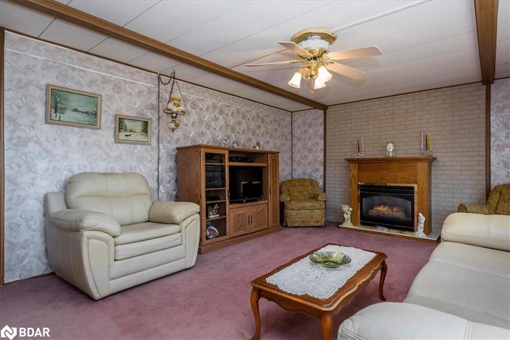10 Mimosa Crescent, Innisfil, ON - Indoor Photo Showing Living Room With Fireplace
