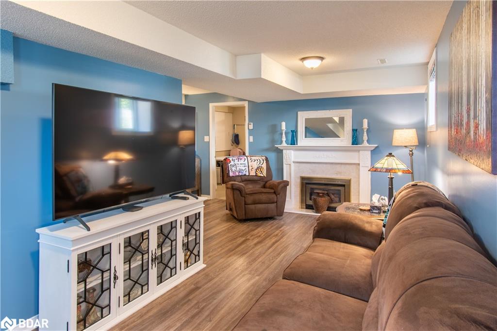 68 Dyer Drive, Wasaga Beach, ON - Indoor Photo Showing Living Room With Fireplace
