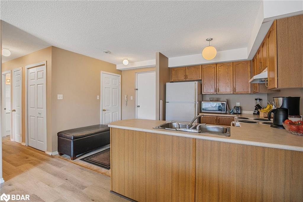 303-107 Bond Street, Orillia, ON - Indoor Photo Showing Kitchen With Double Sink