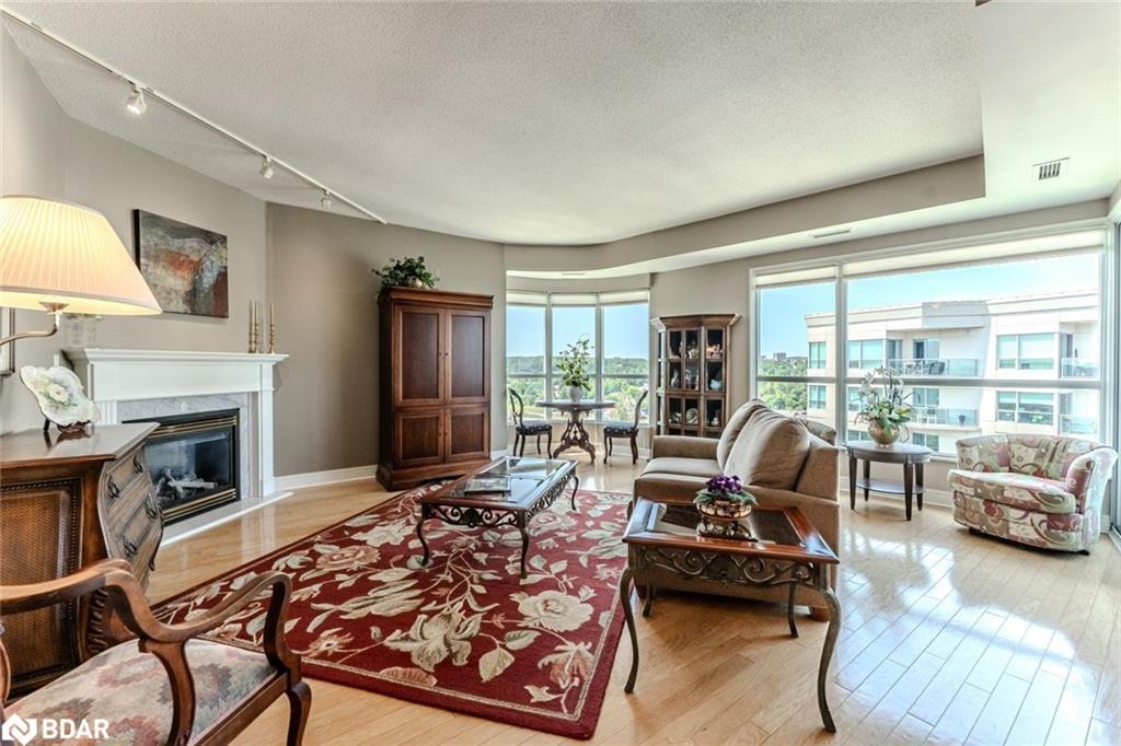Ph2/3-2 Toronto Street, Barrie, ON - Indoor Photo Showing Living Room With Fireplace