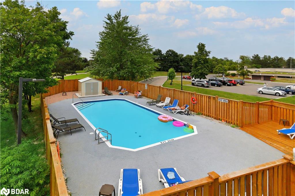501-6720 Glen Erin Drive, Mississauga, ON - Outdoor With In Ground Pool