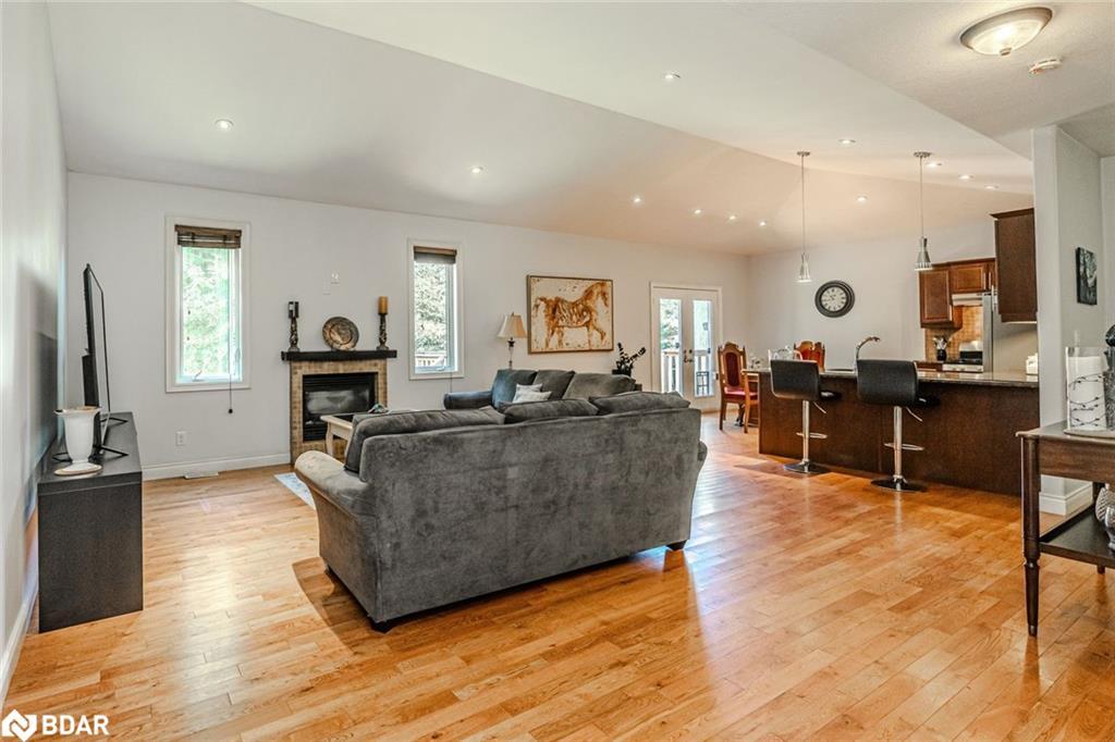 122 Trout Lane, Tiny, ON - Indoor Photo Showing Living Room With Fireplace