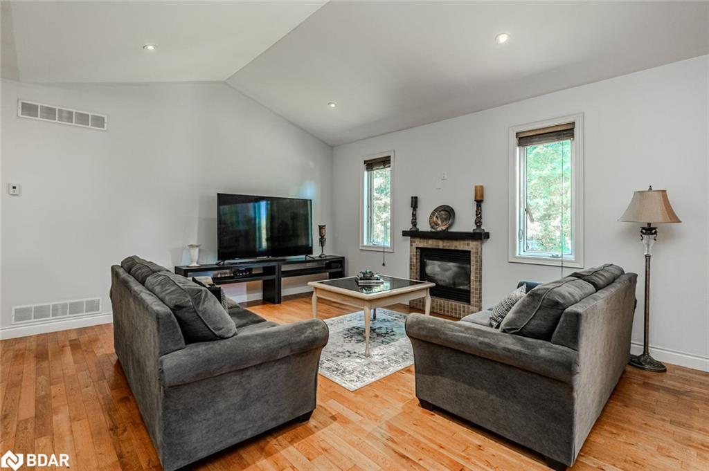 122 Trout Lane, Tiny, ON - Indoor Photo Showing Living Room With Fireplace