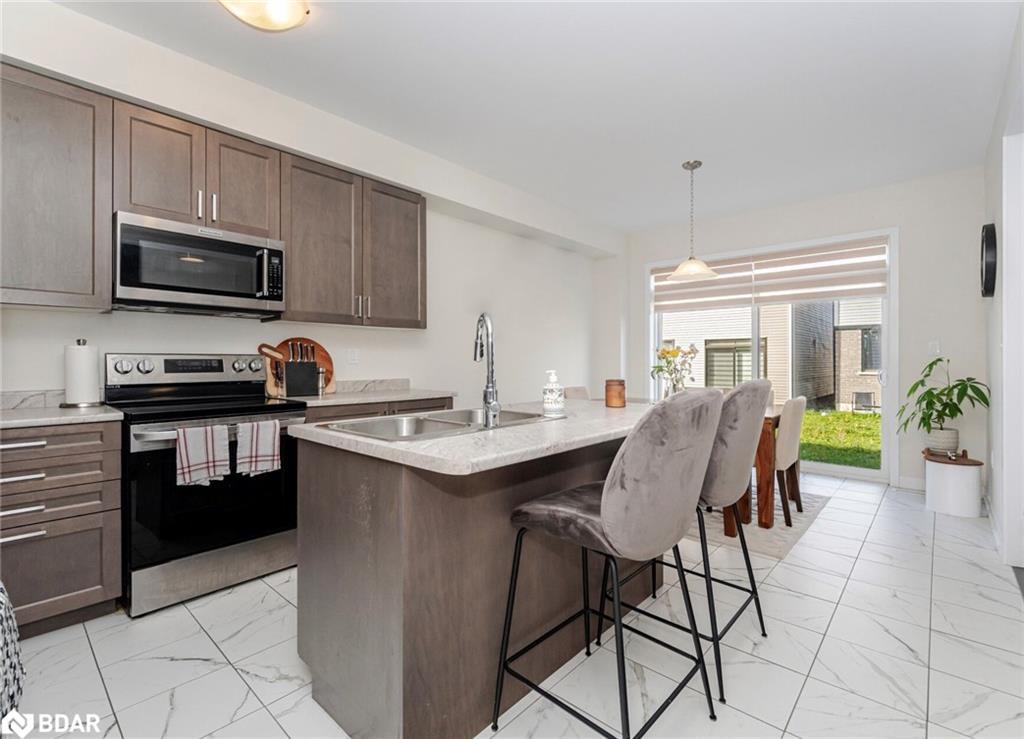 128 Whithorn Crescent, Haldimand, ON - Indoor Photo Showing Kitchen With Stainless Steel Kitchen With Double Sink