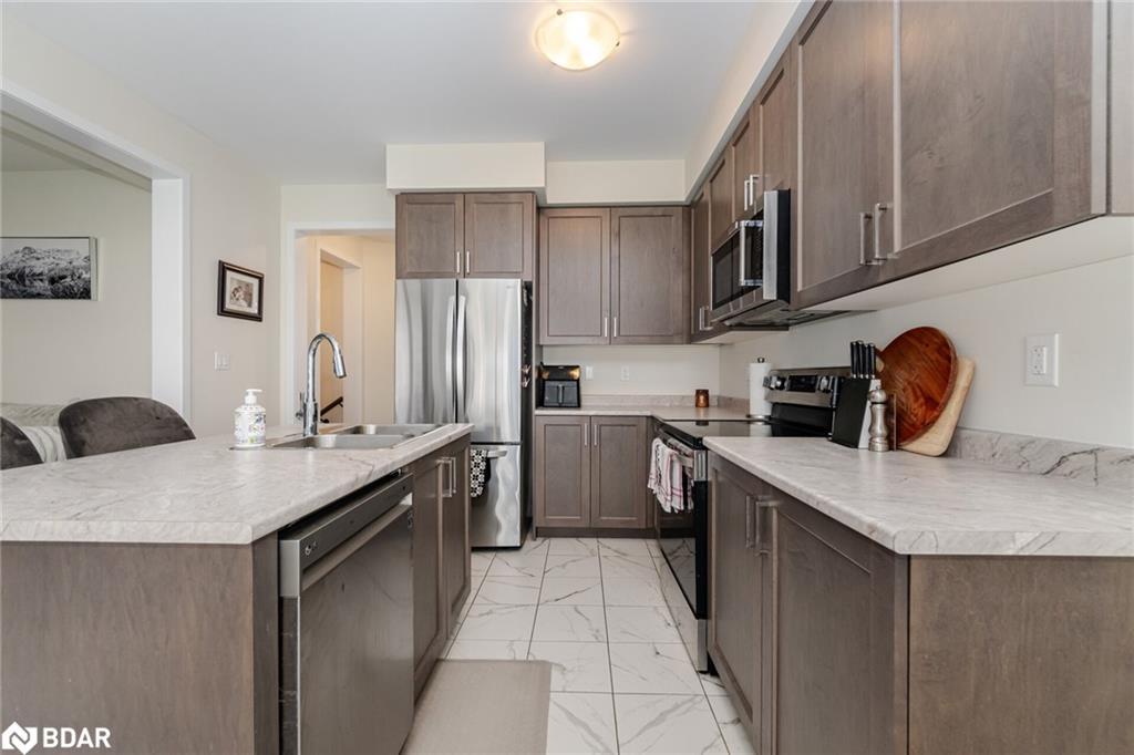 128 Whithorn Crescent, Haldimand, ON - Indoor Photo Showing Kitchen With Stainless Steel Kitchen With Double Sink
