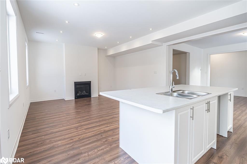 112 West Oak Trail, Barrie, ON - Indoor Photo Showing Kitchen With Fireplace With Double Sink
