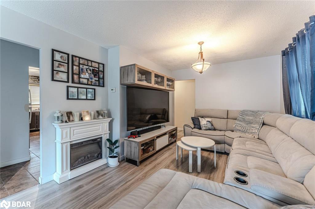 69 Fox Run, Barrie, ON - Indoor Photo Showing Living Room With Fireplace