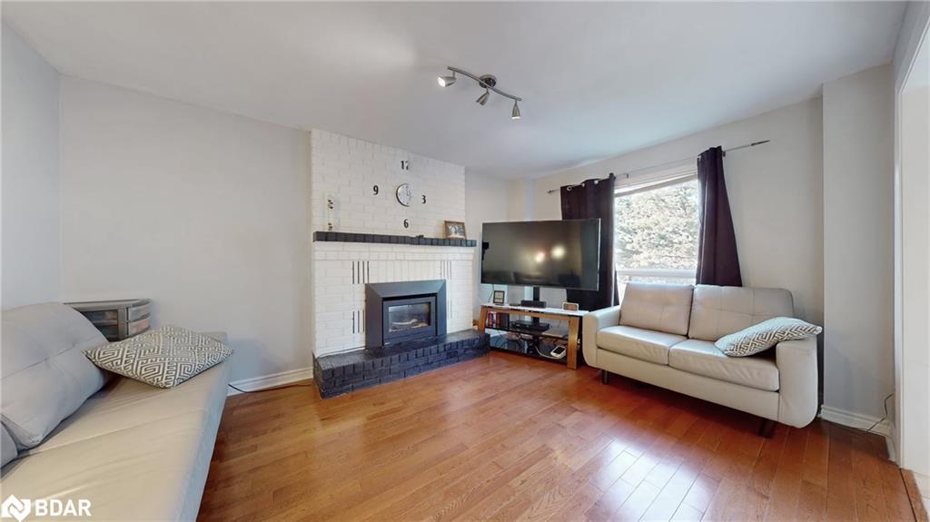 4 Trillium Crescent, Barrie, ON - Indoor Photo Showing Living Room With Fireplace