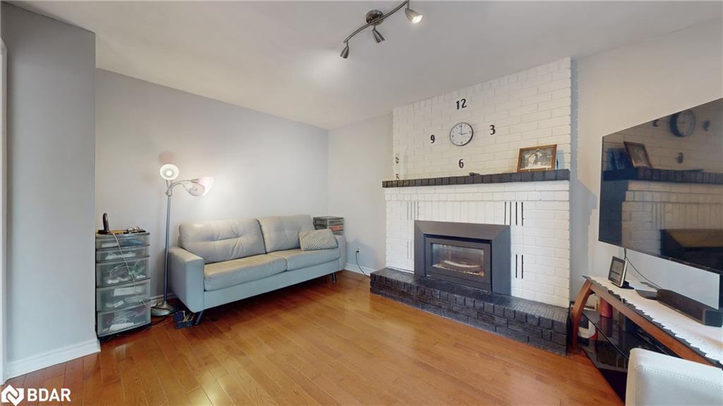 4 Trillium Crescent, Barrie, ON - Indoor Photo Showing Living Room With Fireplace