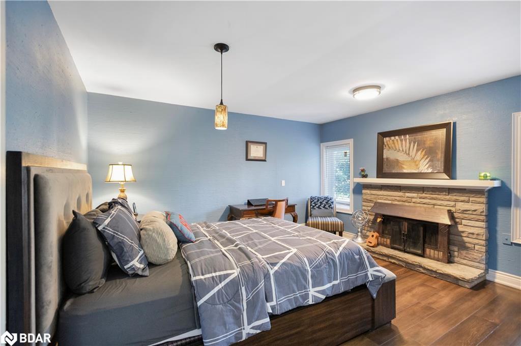 87 Tutela Heights Road, Brantford, ON - Indoor Photo Showing Bedroom With Fireplace