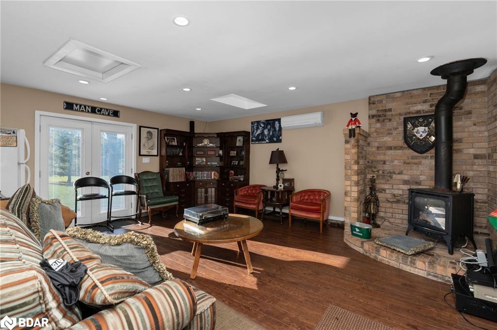 228 Bayshore Road, Innisfil, ON - Indoor Photo Showing Living Room With Fireplace