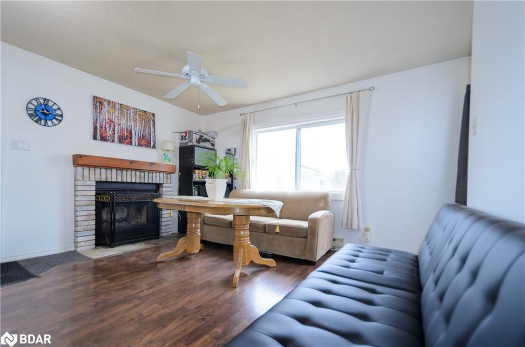 57-19 Dawson Drive, Collingwood, ON - Indoor Photo Showing Living Room With Fireplace