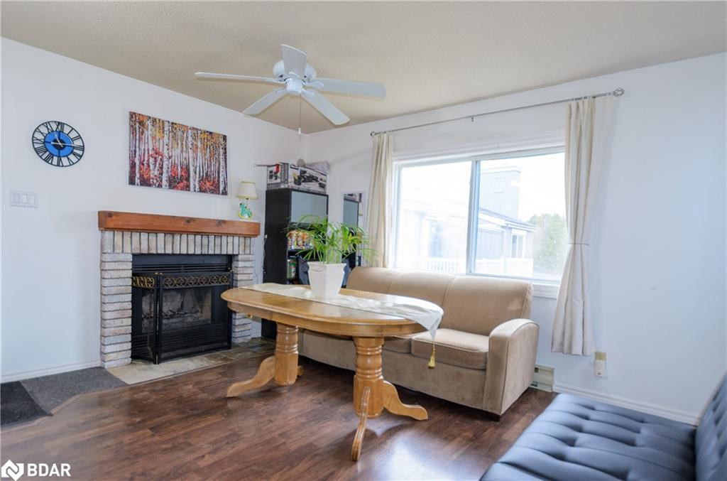 57-19 Dawson Drive, Collingwood, ON - Indoor Photo Showing Living Room With Fireplace