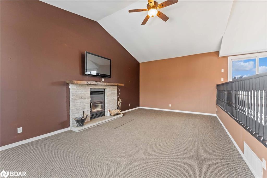 2717 3/4 Sunn Side Side Road, New Lowell, ON - Indoor Photo Showing Other Room With Fireplace