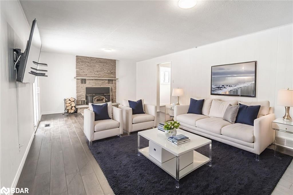5853 Yonge Street, Innisfil, ON - Indoor Photo Showing Living Room With Fireplace