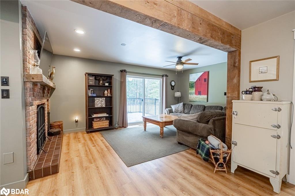 7816 6Th Line, Essa, ON - Indoor With Fireplace