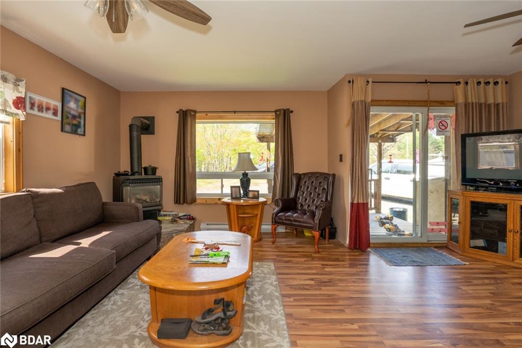 94 High Street, Mactier, ON - Indoor Photo Showing Living Room With Fireplace